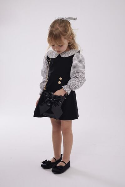 Puantiyeli siyah dokuma elbise (toka dahil)(1 beden büyük tercih edebilirsiniz) 7/8 yaş