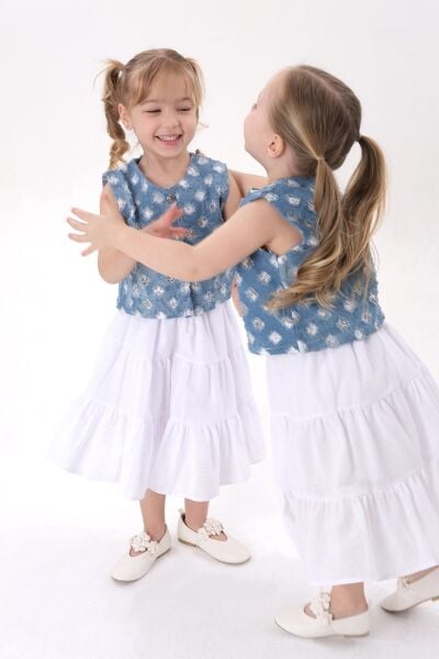 Mavi denim yelekli etekli takım