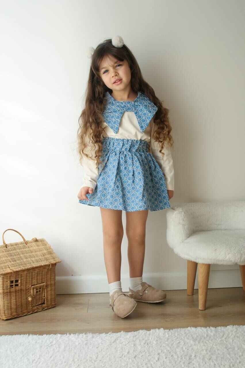 Fiyonk yaka detaylı etekli takım